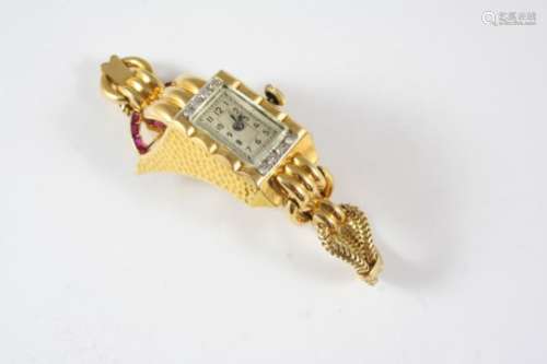 A LADY'S 14CT. GOLD, DIAMOND AND RUBY WRISTWATCH the rectangular-shaped dial with Arabic numerals