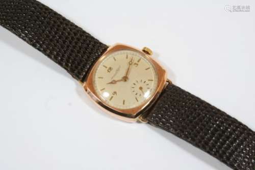 A GOLD WRISTWATCH BY INTERNATIONAL WATCH COMPANY, SCHAFFHAUSEN the signed circular dial with