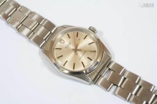 A GENTLEMAN'S STAINLESS STEEL OYSTER WRISTWATCH BY TUDOR ROLEX the signed circular dial with baton