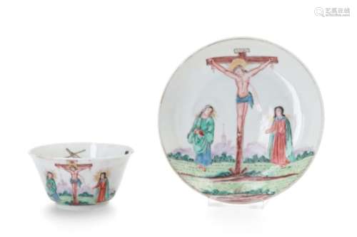 A Chine de commande polychrome porcelain cup with saucer, decorated with the crucifixion of
