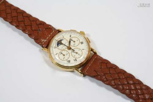 AN 18CT. GOLD CHRONOGRAPH MOON MANUAL WRISTWATCH BY BAUME MERCIER the signed cream dial with Roman