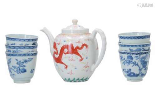 A set of six blue and white porcelain cups, decorated with flowers. Unmarked. China, Qianlong. Added