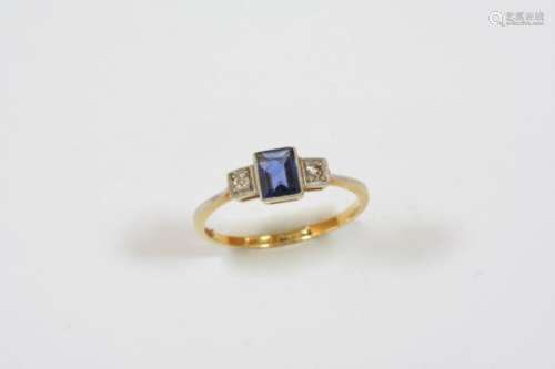 A SAPPHIRE AND DIAMOND THREE STONE RING the rectangular-shaped sapphire is set with two circular-cut