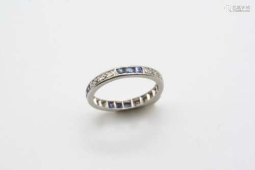 A SAPPHIRE AND DIAMOND FULL CIRCLE ETERNITY RING set alternately with sections of three calibre-
