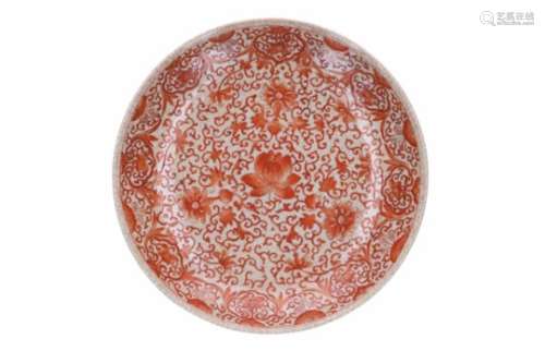 A white and iron red porcelain charger with floral decor. Marked with 6-character mark Jiajing.