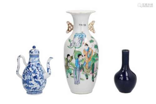 A diverse lot, including 1) a polychrome porcelain vase with two handles, decorated with