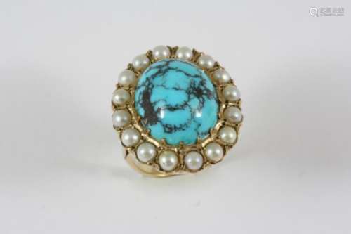 A TURQUOISE MATRIX AND PEARL CLUSTER RING the oval-shaped turquoise matrix is set within a