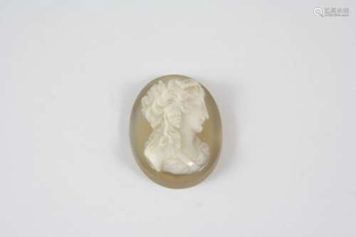 A CARVED AGATE CAMEO depicting the head and shoulders of a bacchante, 3 x 2.5cm.