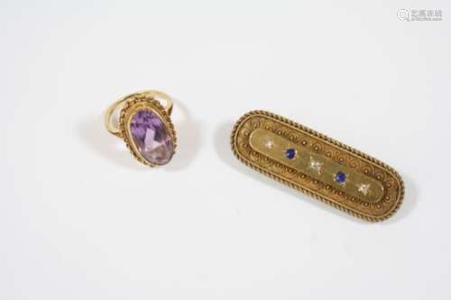 A VICTORIAN 15CT. GOLD AND GEM SET BROOCH the gold brooch with rope and ball decoration and