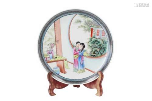 A polychrome porcelain dish, decorated with two ladies looking outside the window. Marked with
