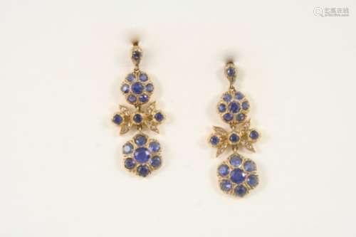 A PAIR OF SAPPHIRE AND DIAMOND DROP EARRINGS of foliate form, each set with graduated circular-cut