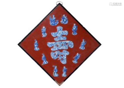 A lacquer panel, decorated with blue and white porcelain immortals and the Shou character. China,