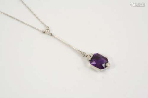 AN ART DECO AMETHYST AND DIAMOND NECKLACE the cut cornered rectangular-shaped amethyst is set with