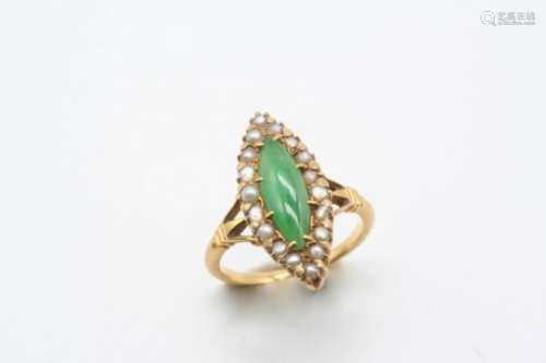 A JADE AND PEARL SET CLUSTER RING the marquise-shaped jade is set within a surround of half