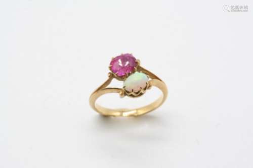 AN OPAL AND PINK SAPPHIRE TWO STONE RING the oval-shaped pink sapphire is set with an oval solid