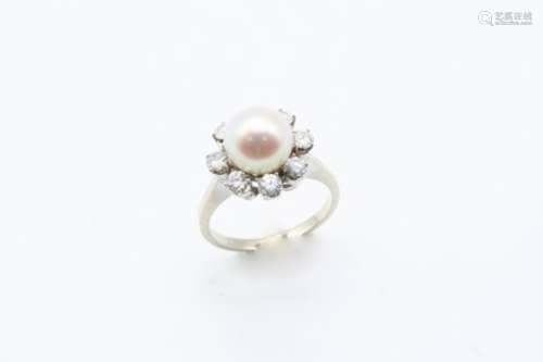 A DIAMOND AND CULTURED PEARL CLUSTER RING centred with a cultured pearl measuring approximately 8.