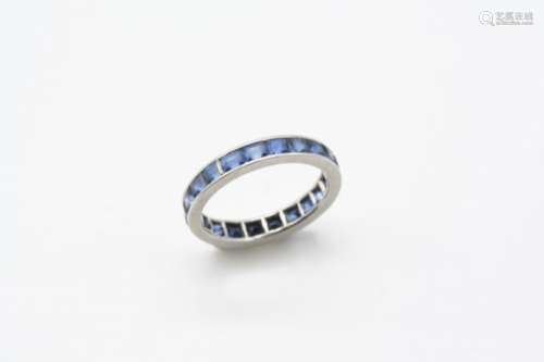 A SAPPHIRE FULL CIRCLE ETERNITY RING set with rectangular-shaped calibre-cut sapphires. Size M.