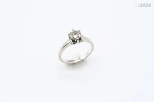 A DIAMOND SOLITAIRE RING the brilliant-cut diamond weighs approximately 0.58 carats and is set in