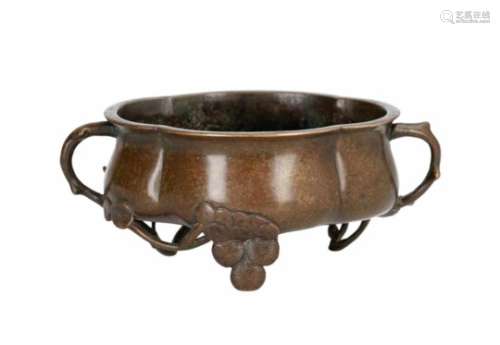 A bronze censer with two handles and relief decor of the three friends of winter. Unmarked. China,