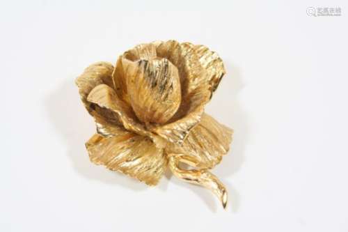 A GOLD PLATED ROSE BROOCH BY CHRISTIAN DIOR realistically formed, signed to the reverse Chr. Dior,