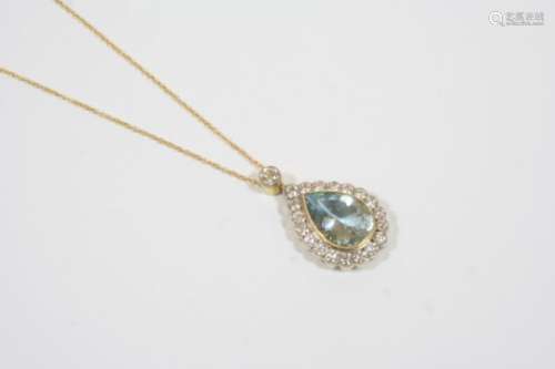 AN AQUAMARINE AND DIAMOND CLUSTER PENDANT the pear-shaped aquamarine is set within a surround of