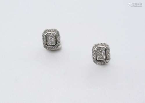 A PAIR OF DIAMOND CLUSTER STUD EARRINGS of rectangular form, each set with small circular-cut