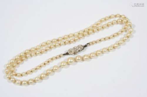A SINGLE ROW GRADUATED NATURAL PEARL NECKLACE the pearls graduate from 2.5mm. to 6.0mm. to a gold