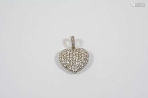 A DIAMOND HEART-SHAPED PENDANT set overall with circular-cut diamonds, in gold, 2.2cm. wide.