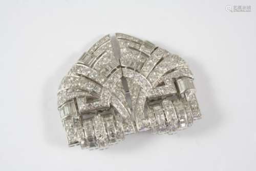 AN ART DECO DIAMOND DOUBLE CLIP BROOCH the arched openwork scrolling design is mounted with