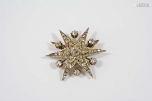 A VICTORIAN DIAMOND STAR BROOCH PENDANT set overall with graduated old brilliant-cut diamonds in