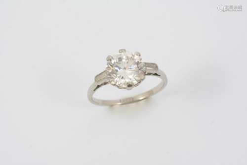 A DIAMOND SOLITAIRE RING the round brilliant-cut diamond weighs 3.05 carats and is set with a