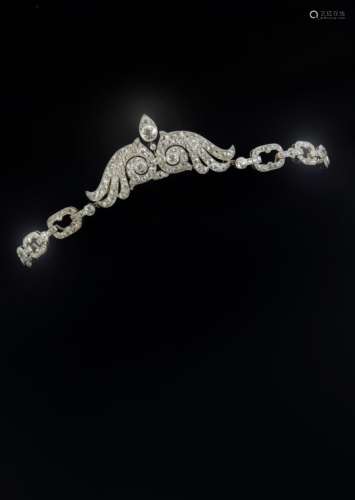 AN EDWARDIAN DIAMOND TIARA, CONVERTING TO A NECKLACE the scrolling centre section is millegrain
