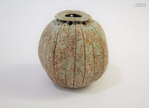 ALAN WALLWORK (BORN 1931) a stoneware pod form vessel, with a circular opening to the top and