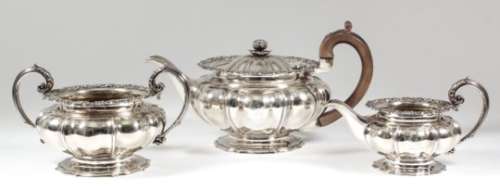 A good George IV silver three-piece tea service with squat circular octagonal lobed bodies, the