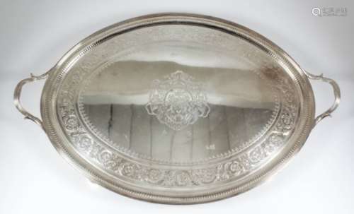 A good George III silver oval two-handled tray, the centre engraved with oval panel, full armorial