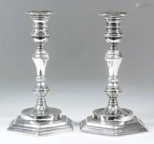 A pair of Elizabeth II Irish cast silver pillar candlesticks of 