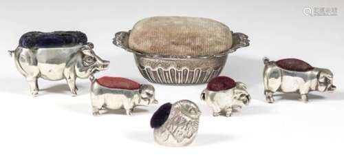 An Edward VII silver pig pattern pin cushion, 2.25ins overall x 1.5ins high, maker's mark rubbed,