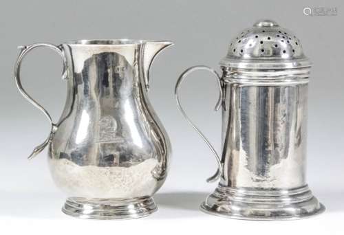 A George II plain silver cylindrical pepper dredger with pierced dome cover, the plain body with