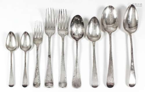 Four Georgian silver table spoons, a selection of silver dessert spoons, tea spoons and table forks,