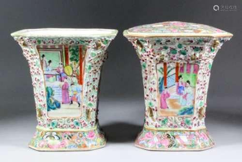 A pair of Chinese Cantonese porcelain octagonal flared flower vases with pierced covers, enamelled