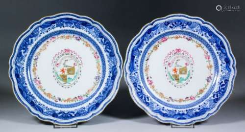 A pair of late 18th Century Chinese blue and white porcelain armorial plates of shaped outline,