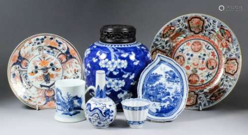 A small collection of Chinese blue and white porcelain, comprising - a beaker of ribbed form painted