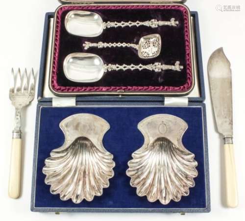 A Victorian silver three-piece fruit serving set with rectangular bowls, cast handles with