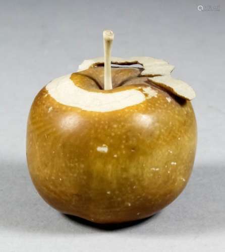A fine Japanese carved ivory and brown stained okimono in the form of a partly peeled apple, 2.