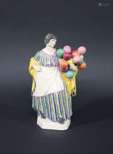 CHARLES VYSE (1882-1971) CHELSEA POTTERY FIGURE of The Balloon Woman, the figure holding balloons