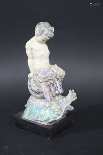 CHARLES VYSE FIGURE - 'THE MORNING RIDE' a pottery figure modelled as a young faun riding a snail,