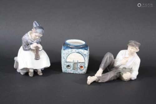 ROYAL COPENHAGEN FIGURES including Model No 865 'Boy at lunch', and 1314 'Amager Girl knitting'.