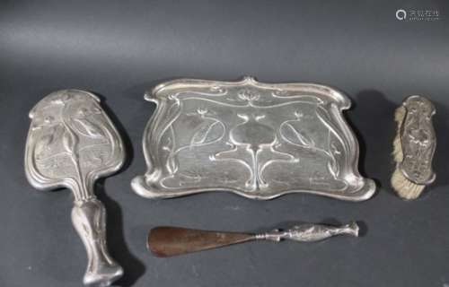 ART NOUVEAU SILVER DRESSING TABLE SET comprising a tray, mirror, brush and shoe horn, each piece