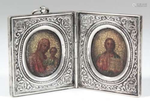 A late 19th Century Russian silvery metal rectangular folding double icon frame with plain exterior,