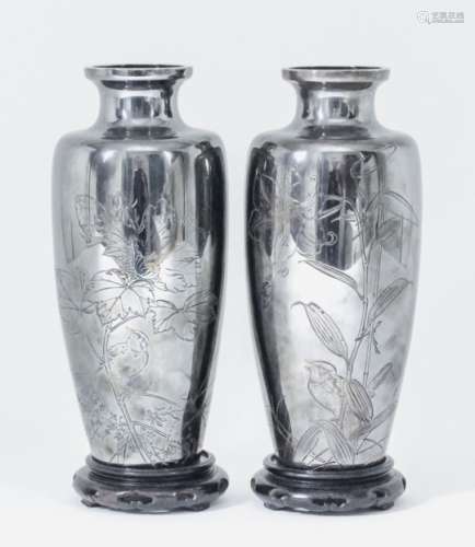 A good pair of Japanese silver high-shouldered slender baluster shaped vases by Kobayashi Kako for